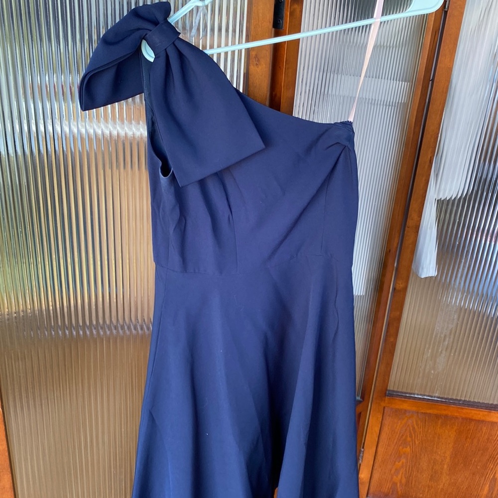 Size 4 Navy Anthropologie one shoulder, bow dress. Great quality, worn once